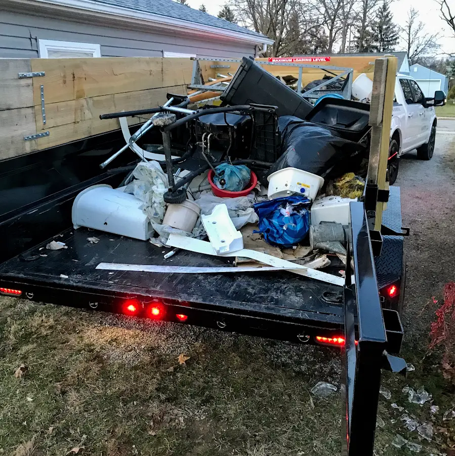 Roll-off dumpster delivered to a residential driveway in Williston